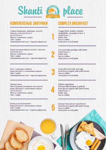 een ontbijtmenu met eieren en brood op tafel bij Panorama Beach Hotel in Tangalle