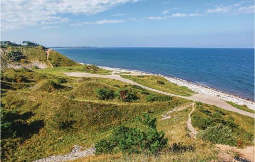 an aerial view of a beach with the ocean at Three-Bedroom Holiday Home In Nykobing Sj in Klint