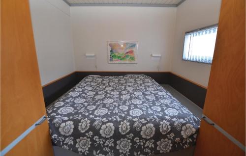 מיטה או מיטות בחדר ב-Bogense Kyst