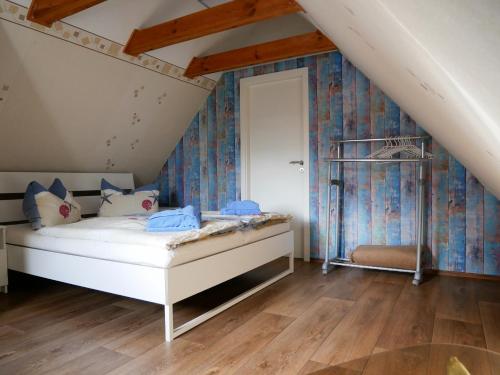 a bedroom with a bed in a attic at Ferienhaus in Kuehlungsborn in Kühlungsborn
