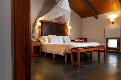 Postel nebo postele na pokoji v ubytování Eco Hotel Boutique & Spa Capitulo Trece - Adults Only