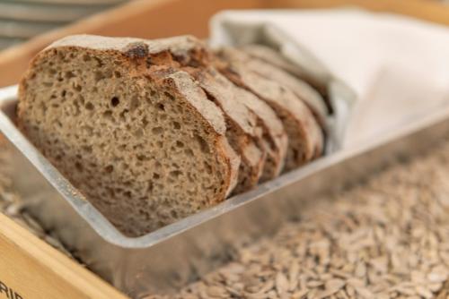 two loaves of bread in a glass case at Hotel Oxelösund in Oxelösund