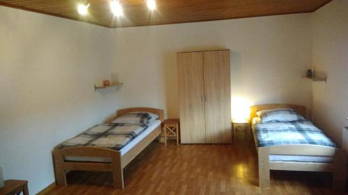 Postel nebo postele na pokoji v ubytování "Klein und Fein"-Monteurzimmer Pohlheim