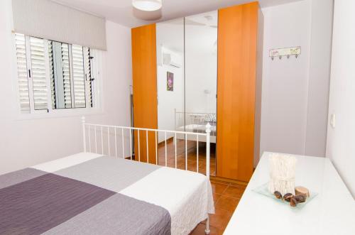 En eller flere senge i et værelse på Casa Piedra Picuda 1