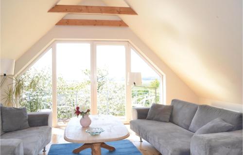  Amazing home in Grenaa with 8 Bedrooms, WiFi and Indoor swimming pool -  Room  picture :   Tea/Coffee maker    Shower    TV                           