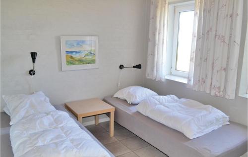  Amazing home in Grenaa with 8 Bedrooms, WiFi and Indoor swimming pool -  Room  picture :   Tea/Coffee maker    Shower    TV                           