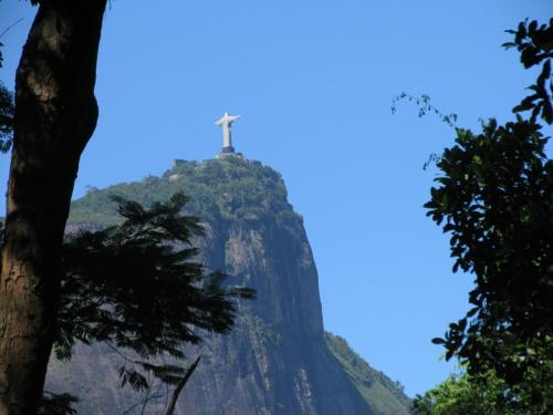 a cross on top of a mountain at Apartamento de Férias Copacabana Rio de Janeiro in Rio de Janeiro