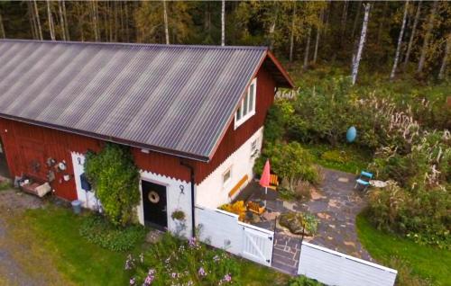 an aerial view of a red and white house at Awesome Apartment In Grythyttan in Grythyttan
