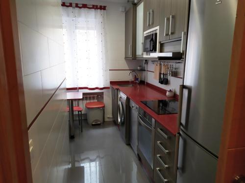 Kuchyň nebo kuchyňský kout v ubytování Homelunead Apartamento en Gijon Centro al lado de la Playa
