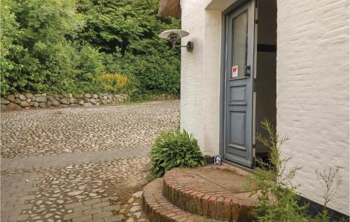 a door on the side of a building at Herligheden in Aabenraa