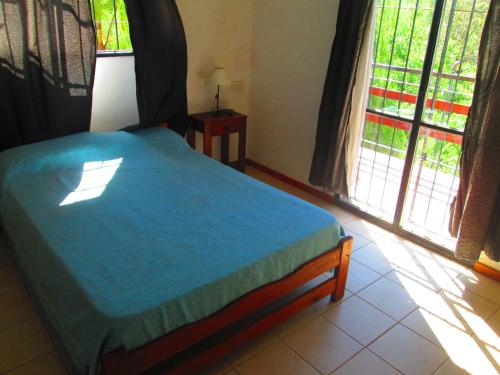 Postel nebo postele na pokoji v ubytování Cabañas Mingo y Mariute