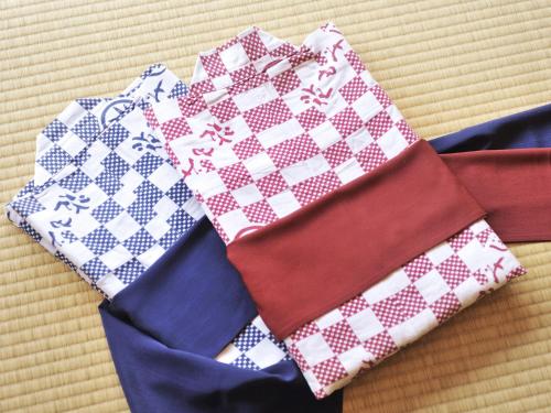 a group of ties sitting on top of a table at Hanamomiji in Jozankei