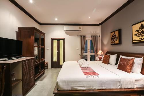 Una cama o camas en una habitación de The Twenty Lodge