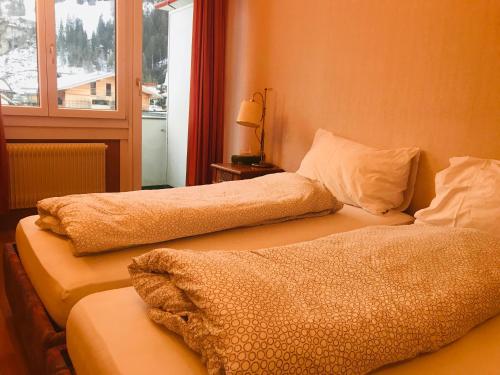 Кровать или кровати в номере Parkhotel Bellevue