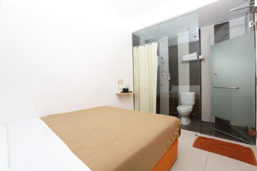 Koupelna v ubytování 1 Hotel Taman Connaught