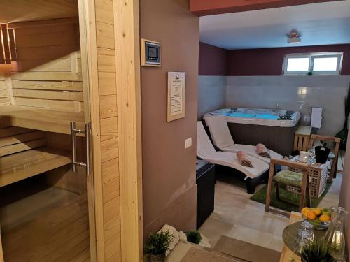 a room with a bed and a table in a room at Villa Badi in Umag