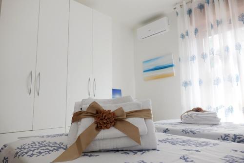 Ένα ή περισσότερα κρεβάτια σε δωμάτιο στο Don Alfonso Apartaments