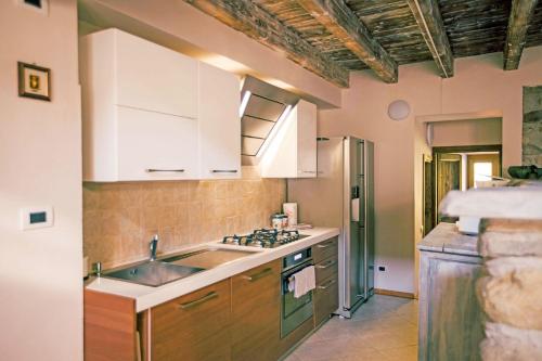 Virtuvė arba virtuvėlė apgyvendinimo įstaigoje Podere Brughee