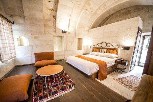 Katil atau katil-katil dalam bilik di Harkasos Cave Hotel