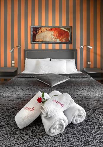 Postel nebo postele na pokoji v ubytování Hotel Petradi