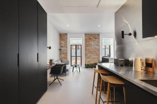 Kuchyňa alebo kuchynka v ubytovaní Owntown Apart Hotel