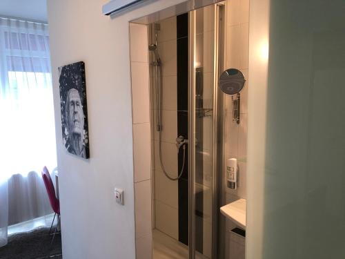 Hotel Mirabell by Maier Privathotelsにあるバスルーム