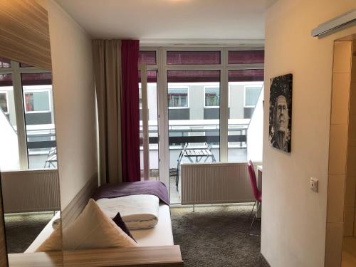 Hotel Mirabell by Maier Privathotelsにあるベッド