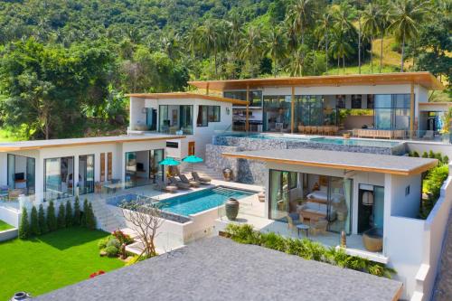 an aerial view of a house with a swimming pool at Asi Chaweng 6 BR sea view in Koh Samui 