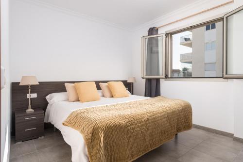 Ένα ή περισσότερα κρεβάτια σε δωμάτιο στο Castello Platja