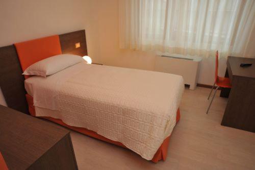 Katil atau katil-katil dalam bilik di Hotel Affittacamere alla Posta