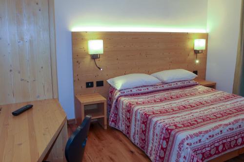 Postel nebo postele na pokoji v ubytování Edelweiss Alpine Nature