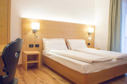 Postel nebo postele na pokoji v ubytování Edelweiss Alpine Nature