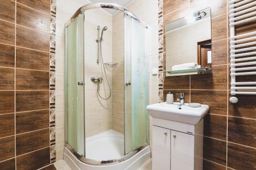 Ванна кімната в Apartament Niecała Prince Deluxe