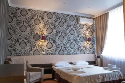 Cama o camas de una habitación en Hotel Lensis