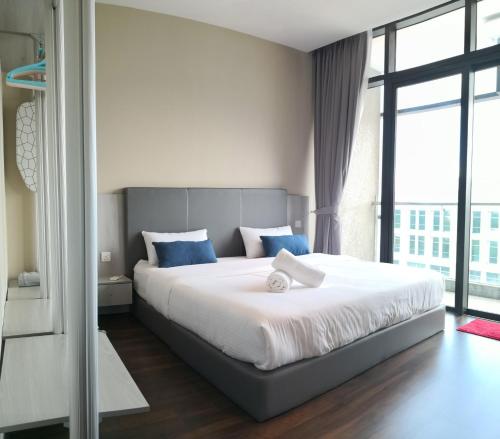 Ένα ή περισσότερα κρεβάτια σε δωμάτιο στο My Misto Homestay, Riverson Soho