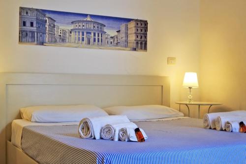 Ένα ή περισσότερα κρεβάτια σε δωμάτιο στο Fenisia Guest House option wellness