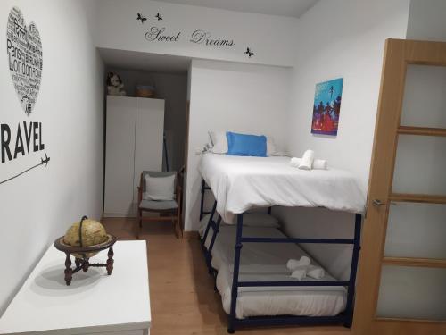 Ένα ή περισσότερα κρεβάτια σε δωμάτιο στο Apartamento Gabierrota