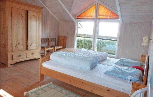 Postel nebo postele na pokoji v ubytování 3 Bedroom Amazing Home In Tranekr