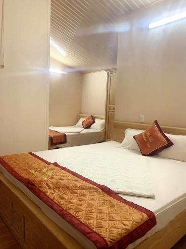 Katil atau katil-katil dalam bilik di Cat Ba Mountain View Homestay