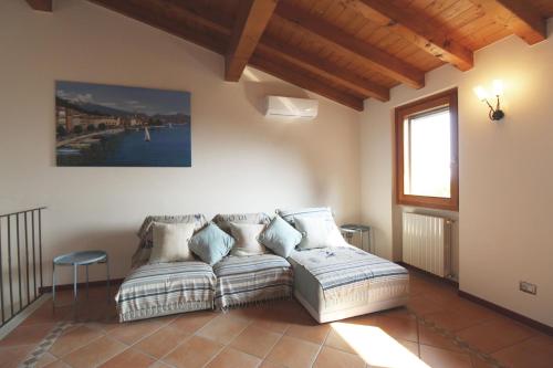 Un pat sau paturi într-o cameră la Villa Belvedere