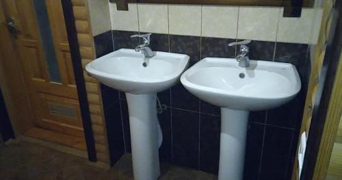 Koupelna v ubytování Дім з видом на гори.