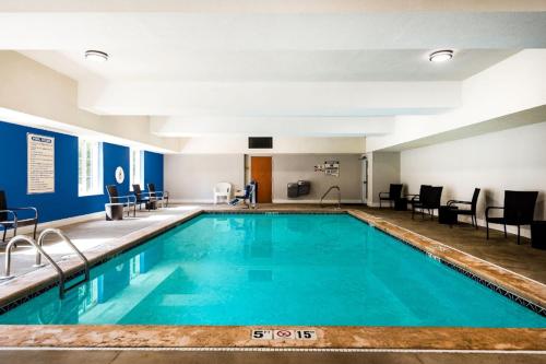 a large swimming pool in a hotel room at Holiday Inn Express Charlotte West - Gastonia, an IHG Hotel in Gastonia