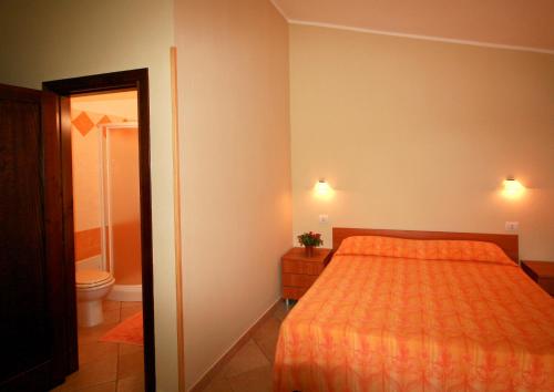 Postel nebo postele na pokoji v ubytování Agriturismo da Pina