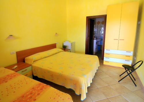 Postel nebo postele na pokoji v ubytování Agriturismo da Pina