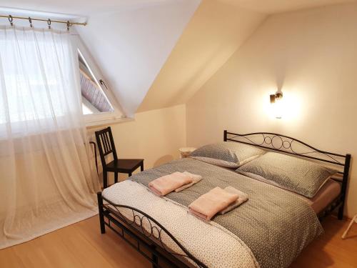 Ένα ή περισσότερα κρεβάτια σε δωμάτιο στο Apartment Barje I