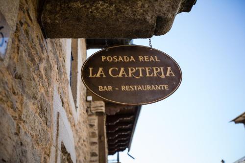 Posada Real La Carteriaに飾ってある許可証、賞状、看板またはその他の書類