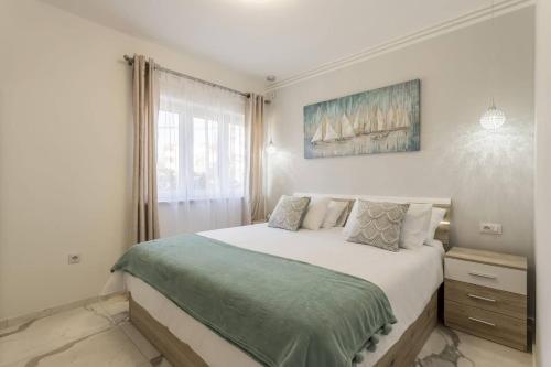 Postel nebo postele na pokoji v ubytování Royal Gold Apartment