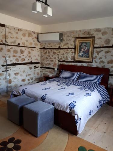 Postel nebo postele na pokoji v ubytování Bona's Home