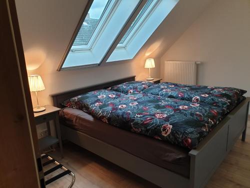 En eller flere senge i et værelse på Ferienhof Mochowsee