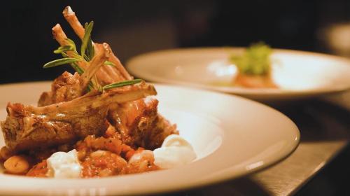 a white plate of food on a table at Teach de Broc in Ballybunion